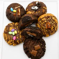 Large triple chocolate cookie filled with chocolate ganache and topped with speckled eggs
