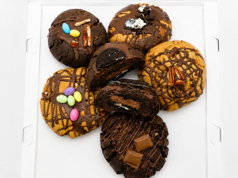 Beautifully decorated cookie treats with colorful icing and fun designs